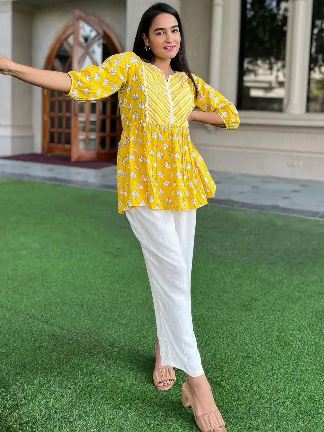 yellow-printed-cotton-a-line-kurti-libas-1.jpg Yellow Printed Cotton A-Line Kurti - Image 1
